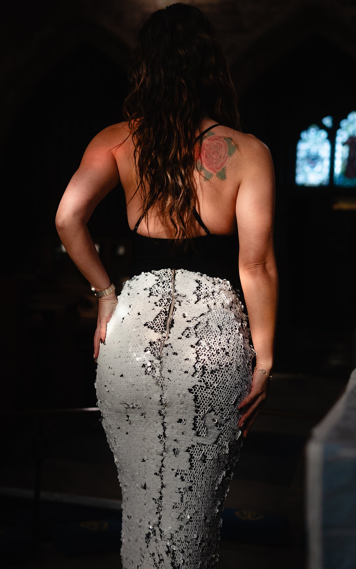 Two in one black and white sequin ensemble with black strap bodycon top that can be worn as a mini dress