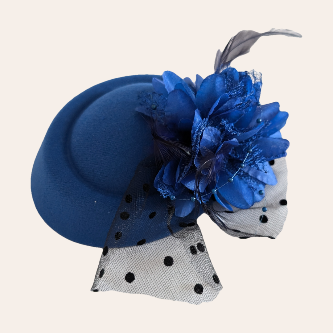Royal blue pill box fascinator with black polka net