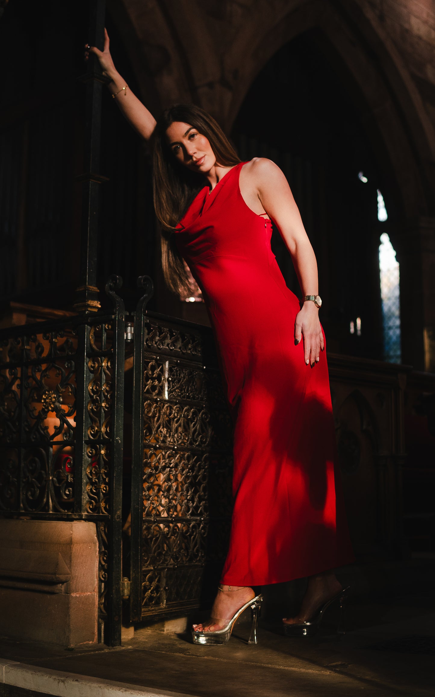 The Serena dress; gorgeous red plunge neck and cross back midi dress and strikingly beautiful gold ornament at the back .
