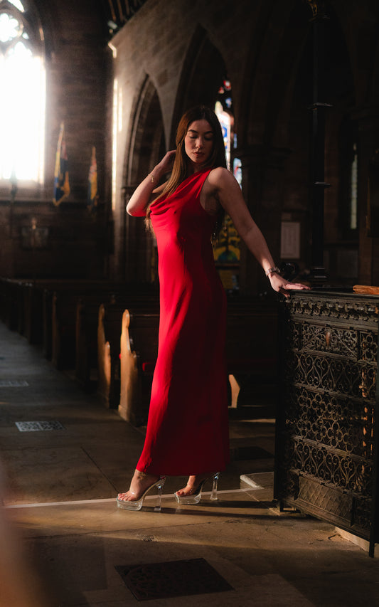 The Serena dress; gorgeous red plunge neck and cross back midi dress and strikingly beautiful gold ornament at the back .