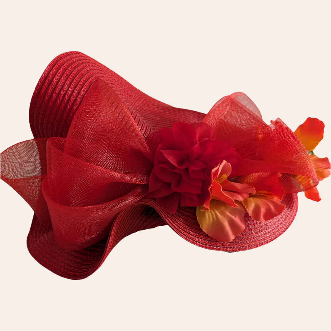Coral assymetric rouge fascinator